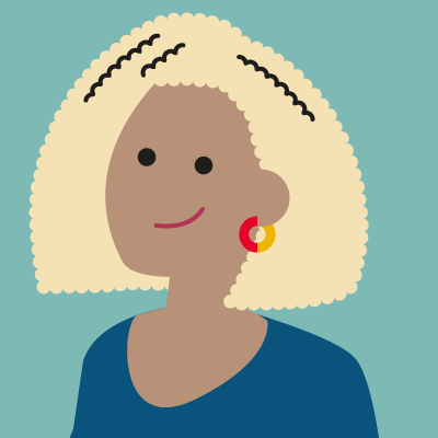 De Werkplaats avatar. Een vrouw die glimlacht, met getinte huidskleur, blond haar en een blauw shirtje.